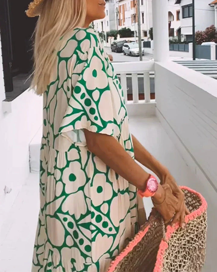 CHRISTINE | Robe d'été longue avec coupe fluide et motif graphique élégant