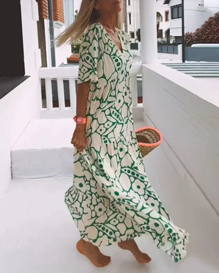CHRISTINE | Robe d'été longue avec coupe fluide et motif graphique élégant