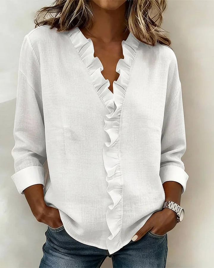 Chiara | Blouse élégante à col V et volants délicats