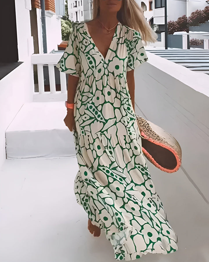 CHRISTINE | Robe d'été longue avec coupe fluide et motif graphique élégant