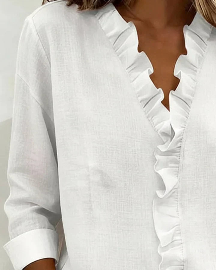 Chiara | Blouse élégante à col V et volants délicats