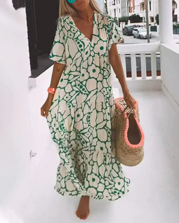 CHRISTINE | Robe d'été longue avec coupe fluide et motif graphique élégant