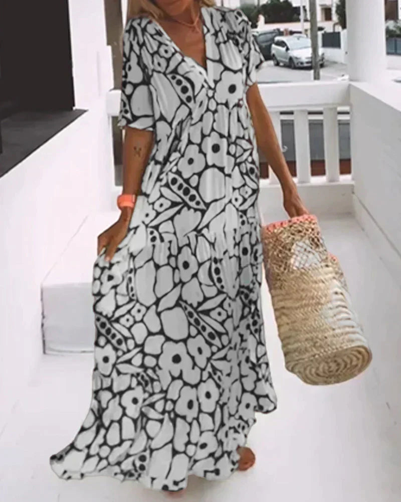 CHRISTINE | Robe d'été longue avec coupe fluide et motif graphique élégant