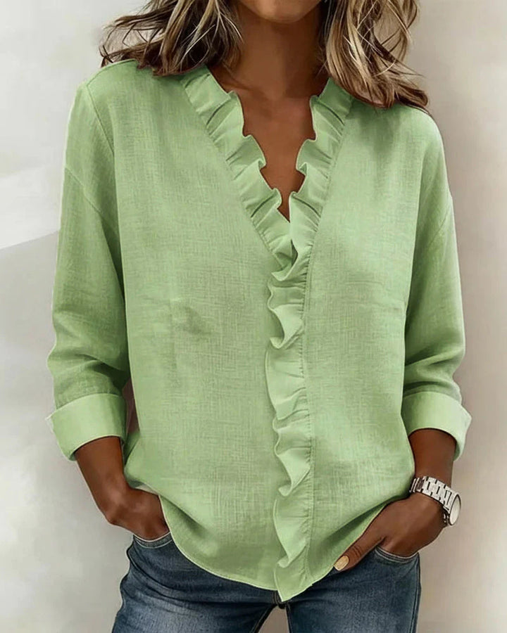 Chiara | Blouse élégante à col V et volants délicats